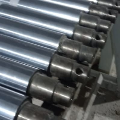A rack of hard chrome plated rods finished at MGE Trading and Services