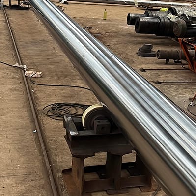 Long hard chrome plated shafts on the shop floor at Taloja MIDC